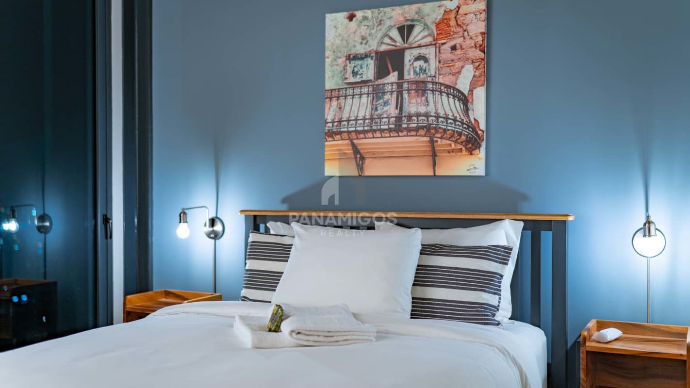 Living room with access to private balcony city skyline view Casco View Casco Viejo