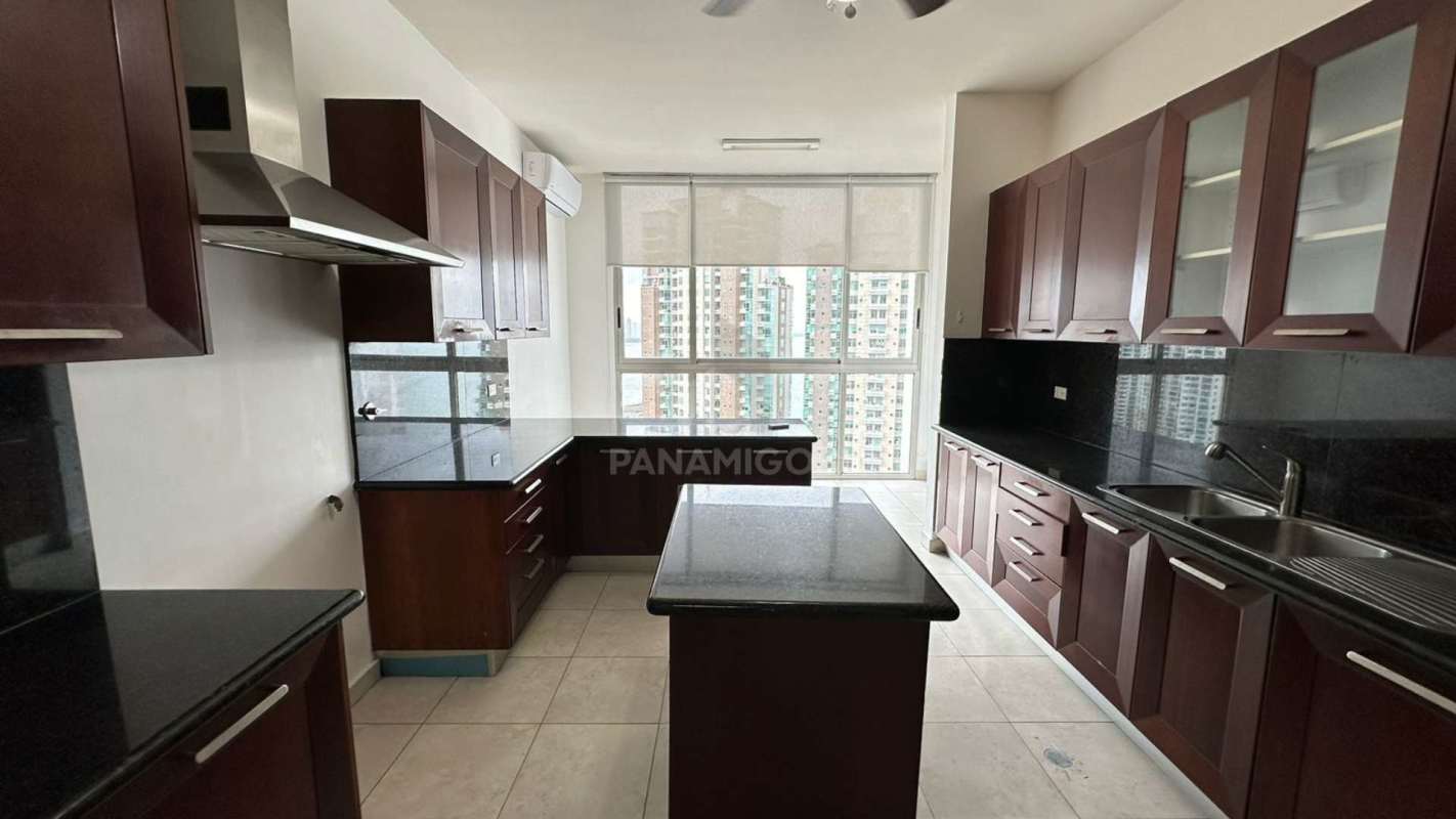 Large empty bedroom with marble floors, windows and city views Punta Pacifica Panama