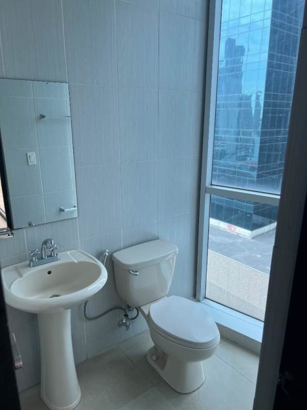 Kitchen with granite countertops, stainless appliances in PH Galería Uno near Soho Mall Panama