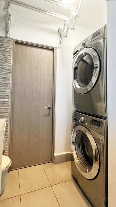 Contemporary bathroom with floating vanity, glass shower enclosure at PH La Loma Panama