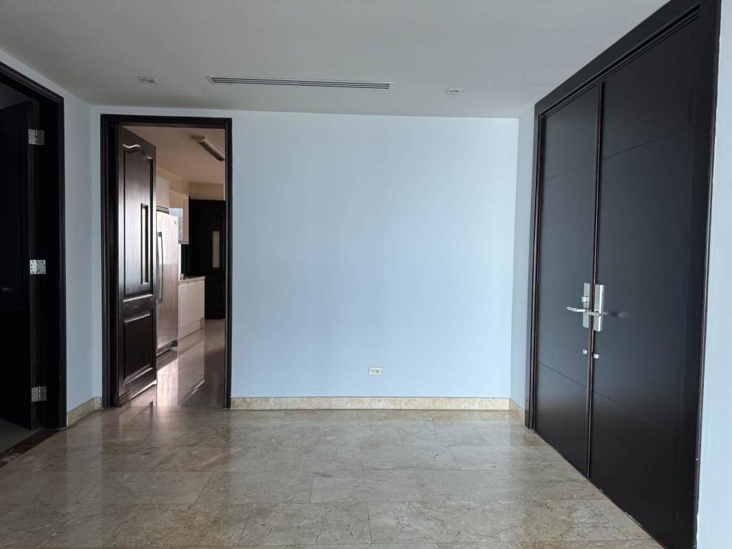 Empty living room with large window and AC in PH Torre Zeus Costa del Este Panama