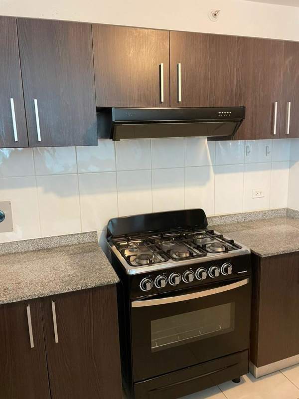 Modern bathroom with glass enclosed shower and vanity in Edison Park Panama City