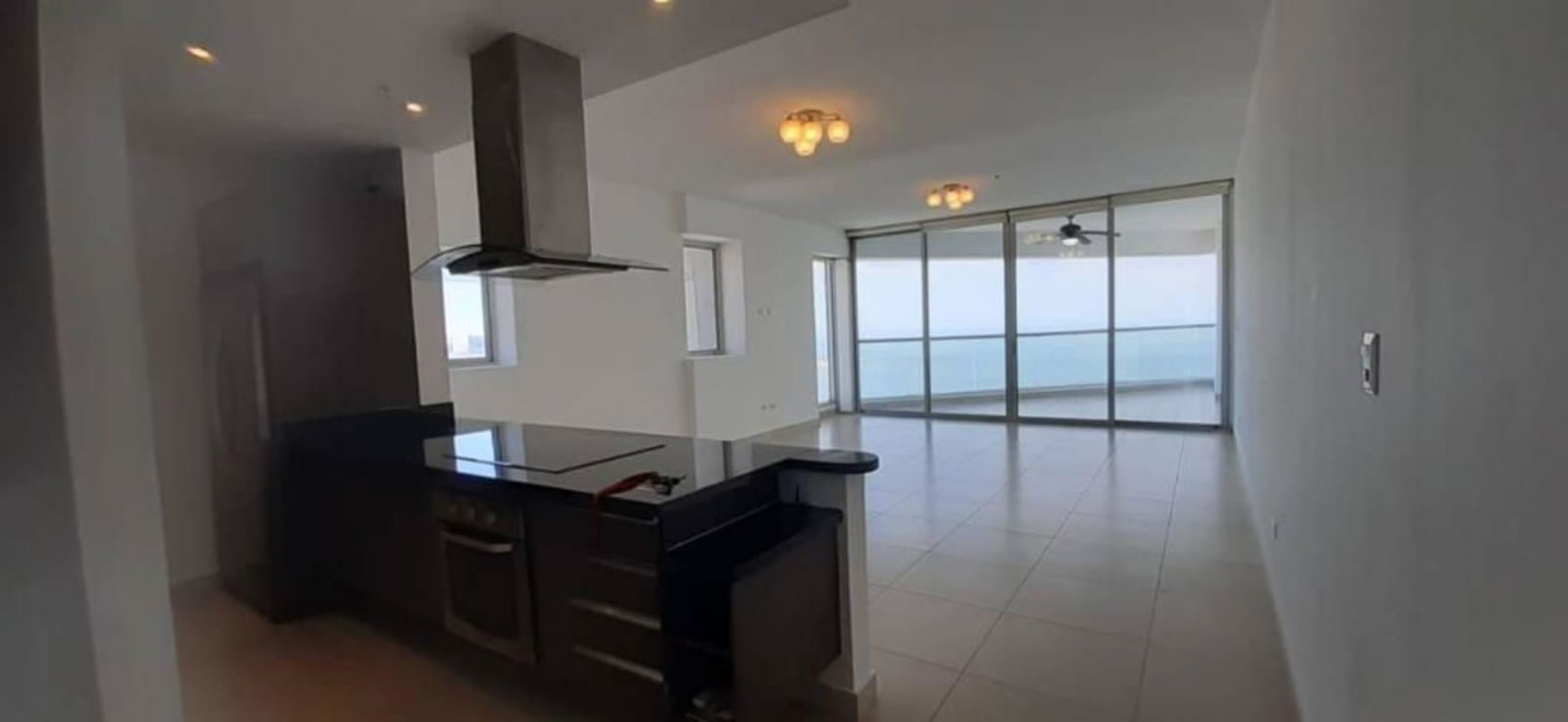 Open plan kitchen with breakfast bar and stunning ocean view in Rivage Tower Panama