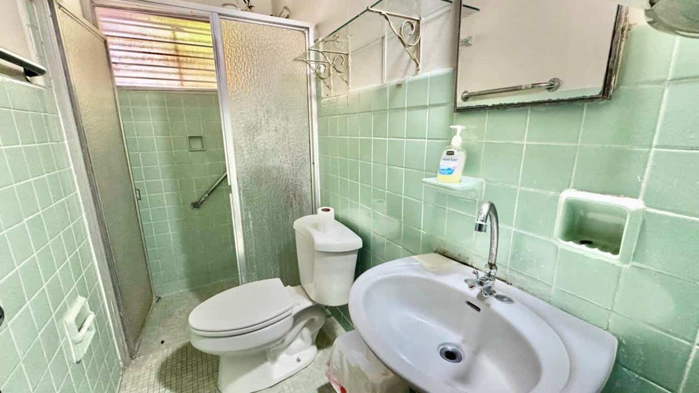 Bedroom with closet space and large window in house in Altos de Betania Panama