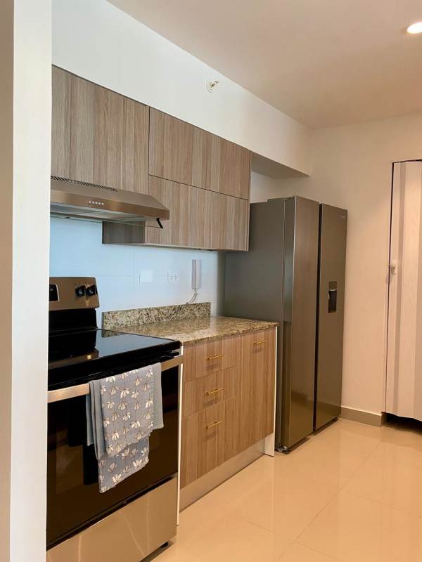 Kitchen with granite countertops, built-in appliances PH Lemon Tower Panama