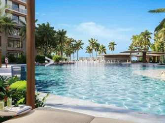 Infinity pool with palms and pool bar in luxury community Buenaventura Panama