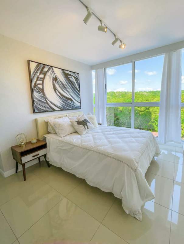 Rooftop terrace lounge area with pergola and city views Edison Park Panama