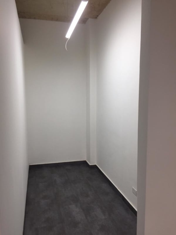 Enclosed private office space with glass partitions in Galerías Balboa Panama City