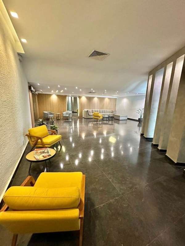 Open concept living dining room with balcony access in PH Moon Tower San Francisco Panama