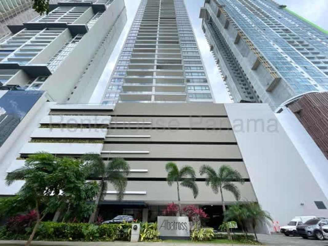 Modern bathroom with double vanity, marble counters and glass shower in PH Albatross Santa Maria Panama