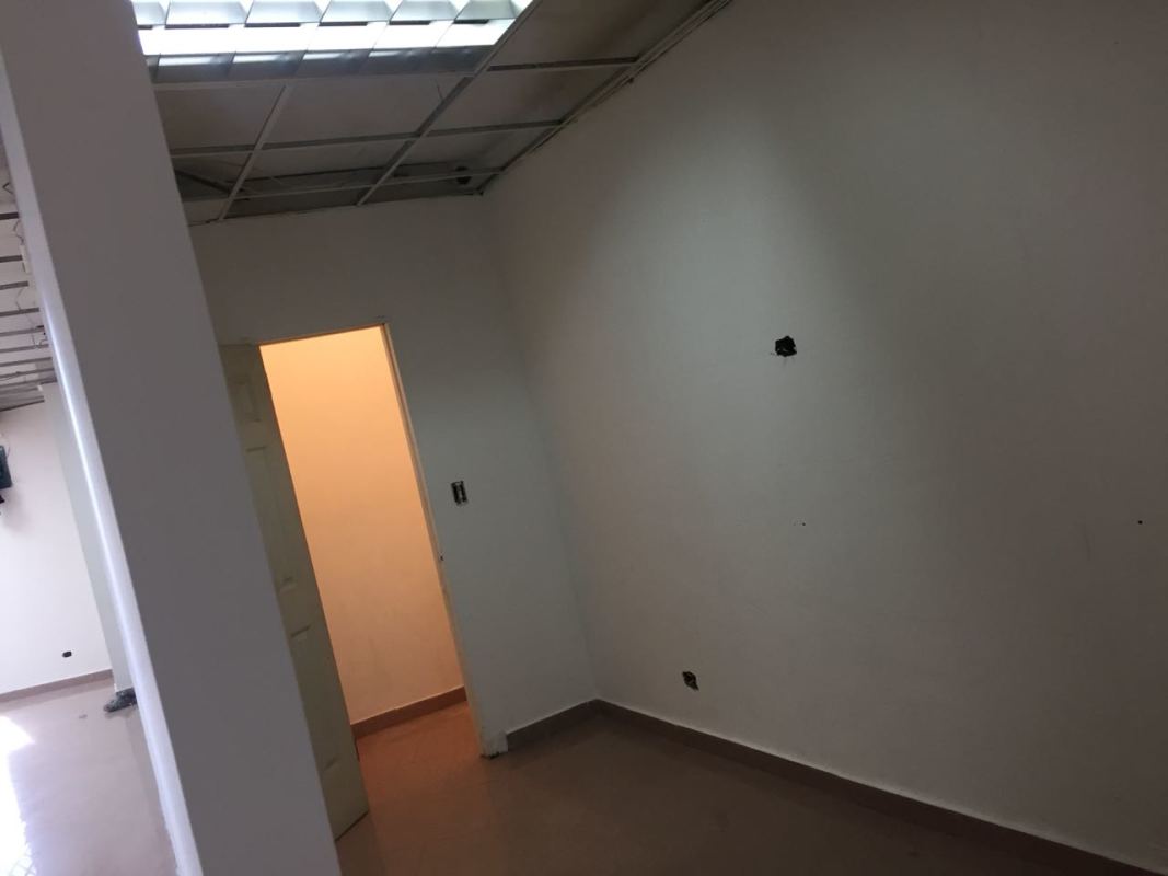 Empty interior room with fluorescent lighting and neutral walls at PH Kitaen La Cresta Panama