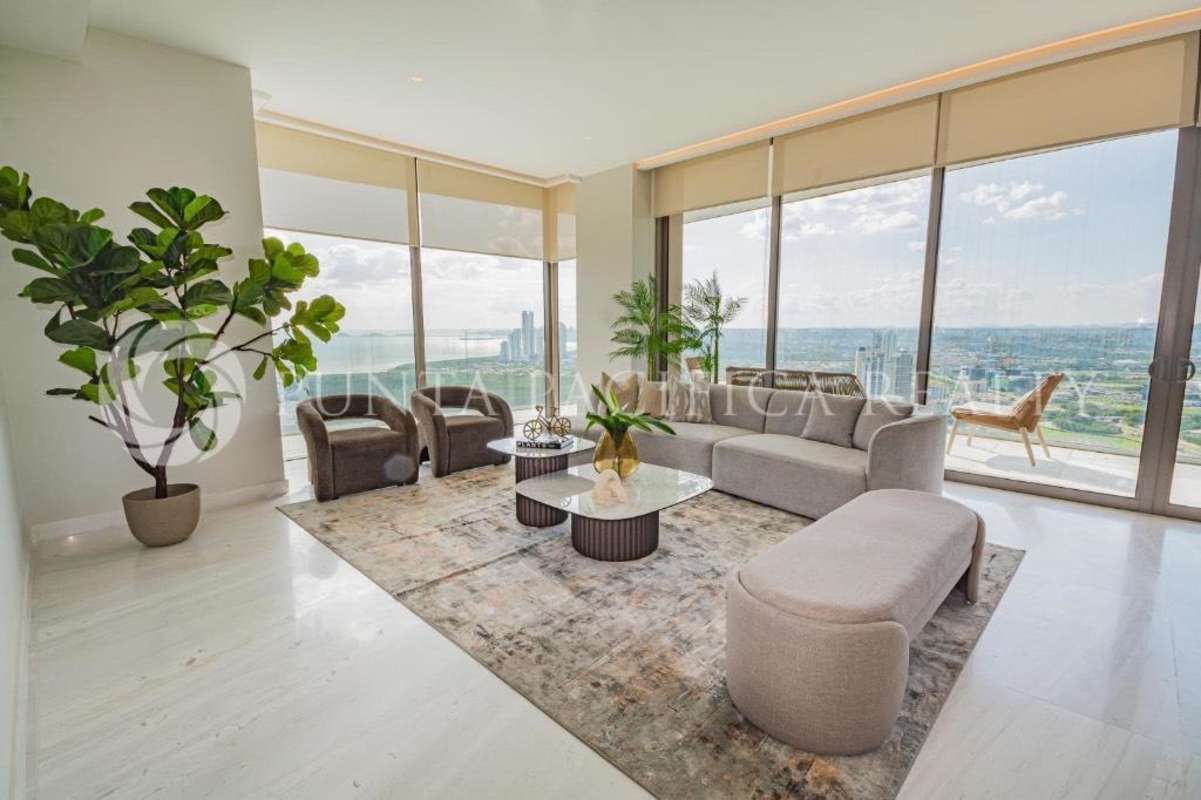 Modern luxury kitchen with marble island, built-in appliances, city and golf views in La Maison Fendi Santa Maria