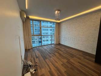 Covered balcony overlooking greenery at Residencial Las Lomas Playas