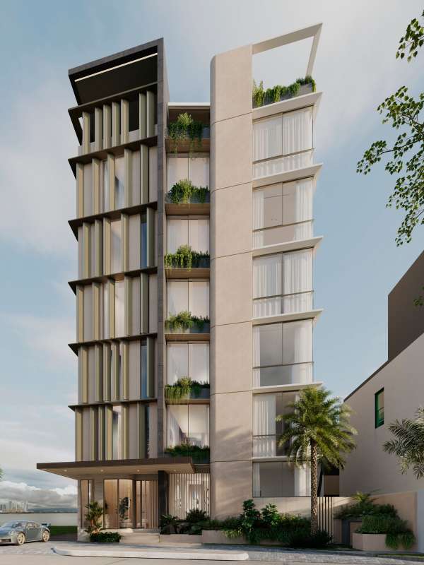 Contemporary multi-story condo tower glass facade green balconies Ocean Reef Panama