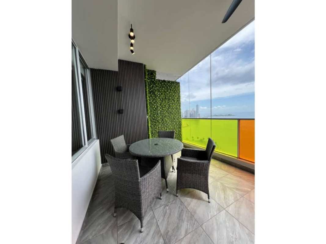 Open kitchen with island and stainless appliances PH Element Avenida Balboa Panama