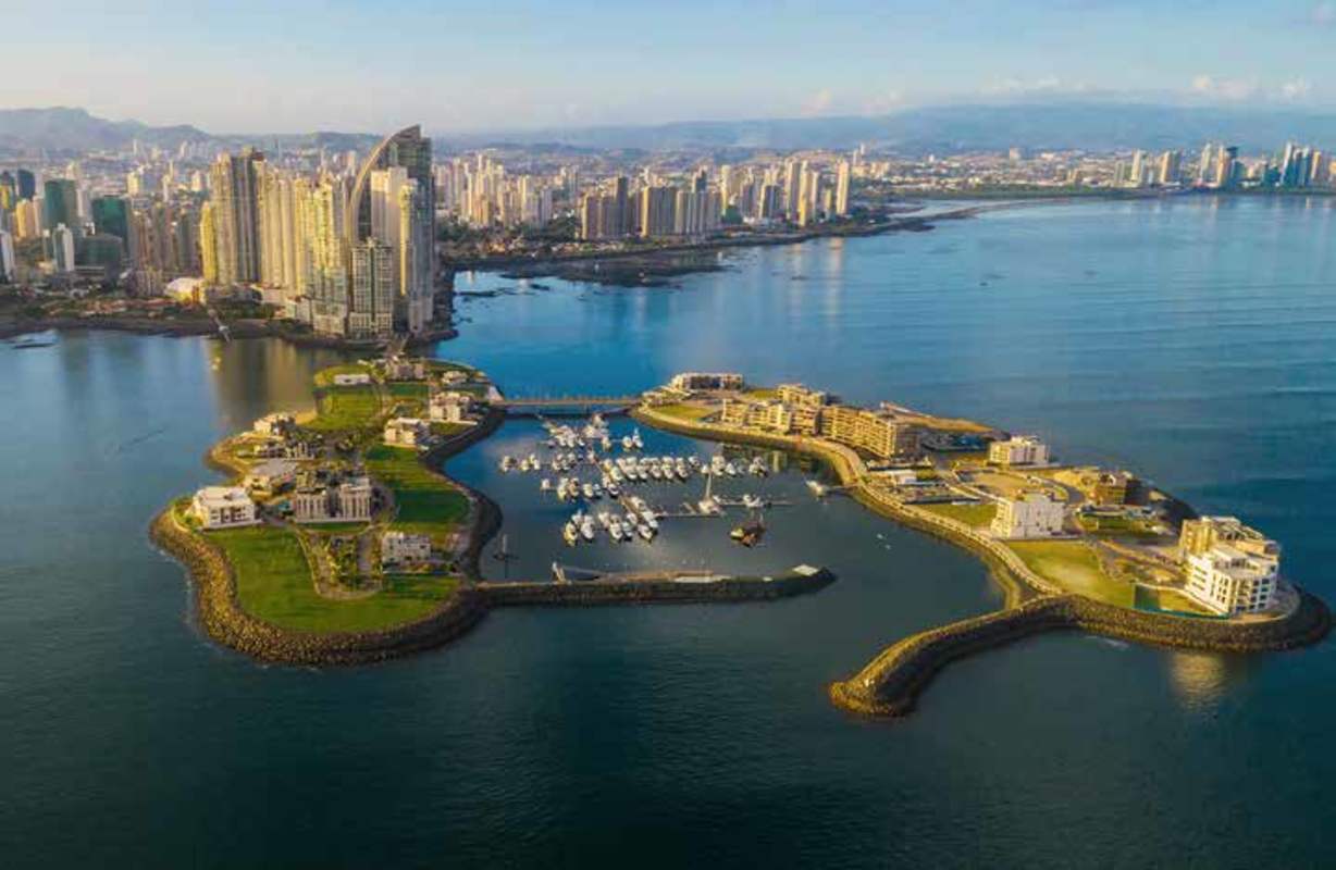 Aerial view of beachfront resort and private marina pier at The Palms Beach Resort Panama