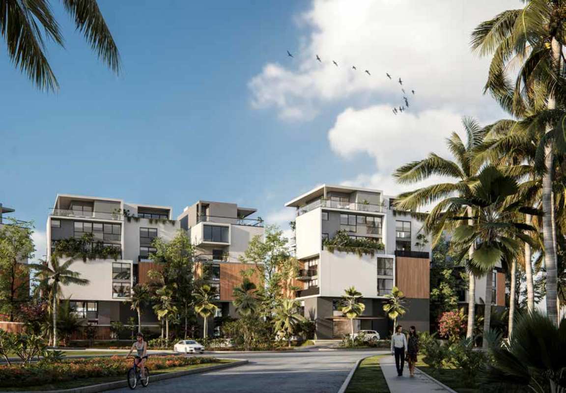 Modern multi-story apartment buildings with green surroundings in The Palms Beach Resort Ocean Reef Panama City