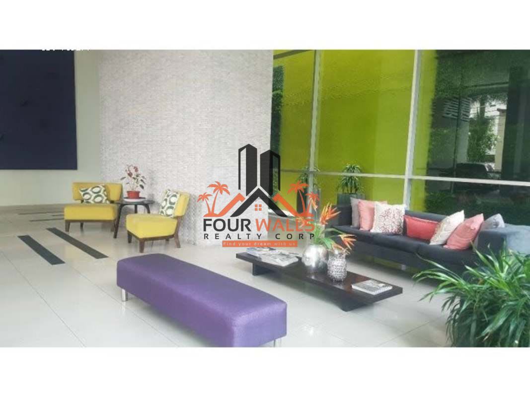 Modern kitchen with dark wood cabinets, granite countertop, stainless steel sink at PH Citrus