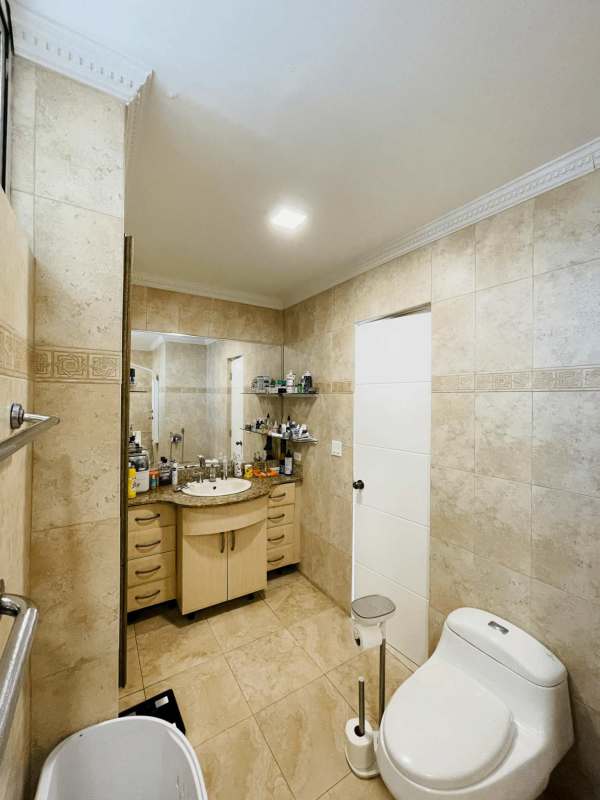 Elegant master bedroom with floor-to-ceiling windows, city and ocean views in PH Pacific Point Punta Pacifica