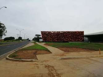 Modern geometric facade building adjacent to land on Avenida Circumbalación Chitré Panama