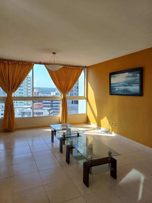 Bright dining room with ceramic tile floors and city views at PH Aurora Tower El Cangrejo Panama