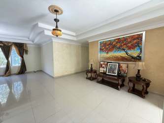 Mediterranean-inspired home with covered patio area, garden, and tiled roof in Cantarrana Chitré Panama