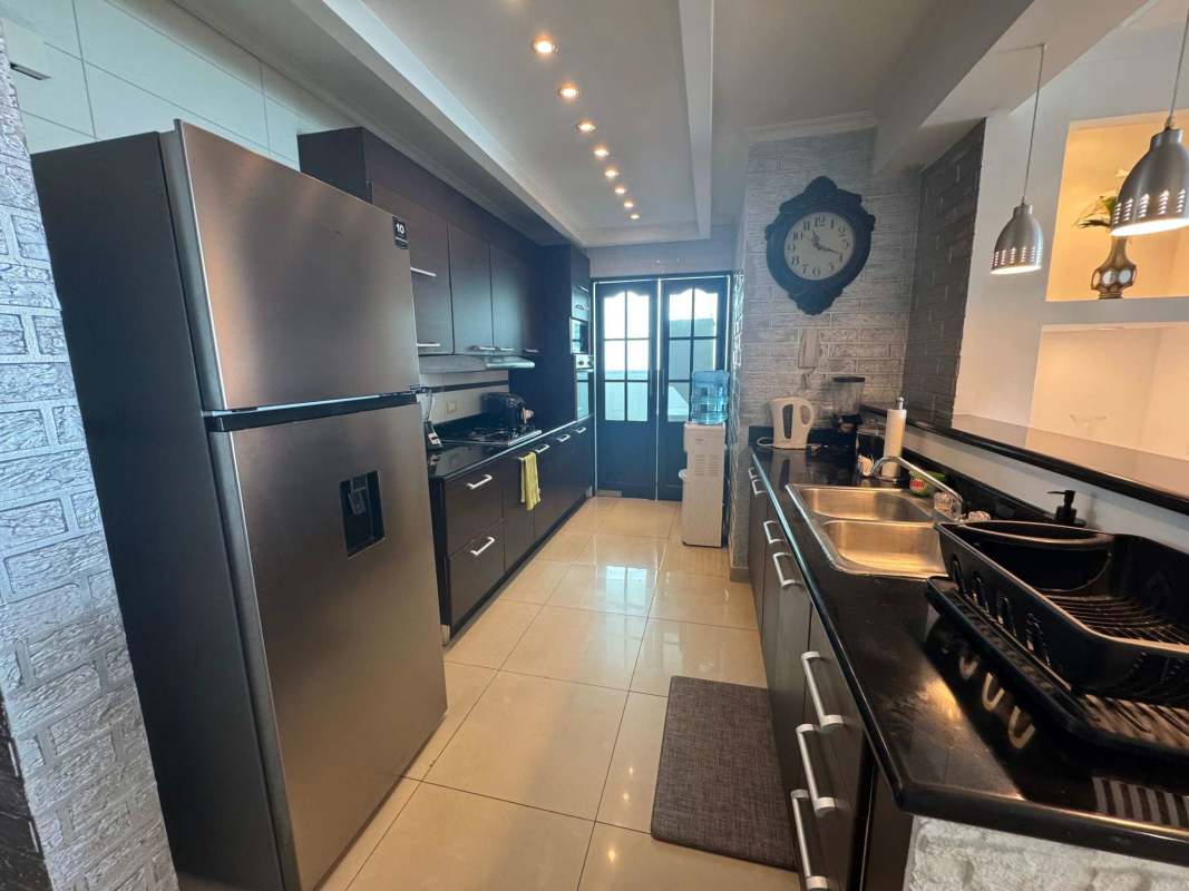 Modern bathroom with Jacuzzi tub, mounted TV, double vanity PH Pacific Sea Panama City