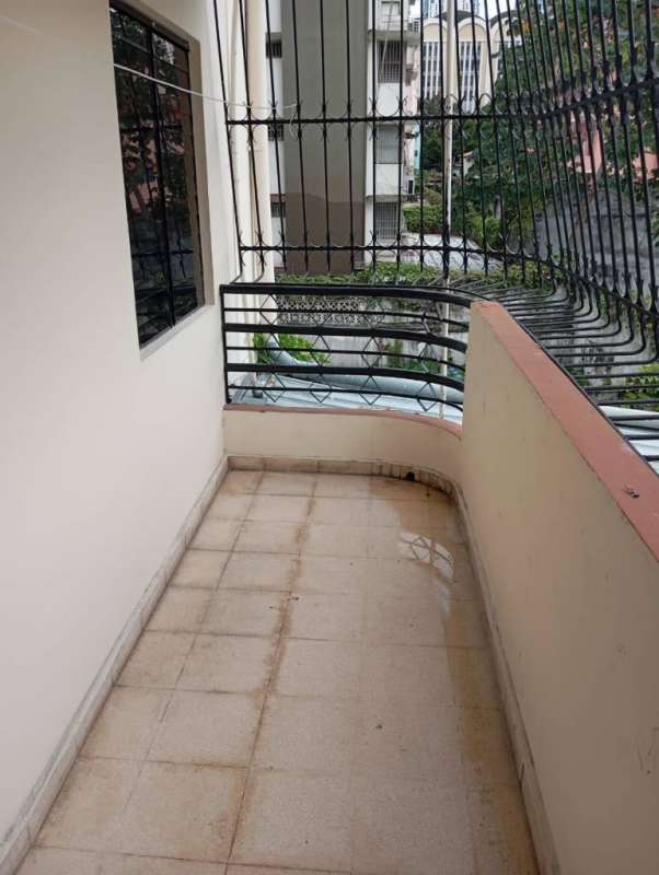 Simple bathroom with blue ceramic tiles in apartment for sale Bella Vista Panama