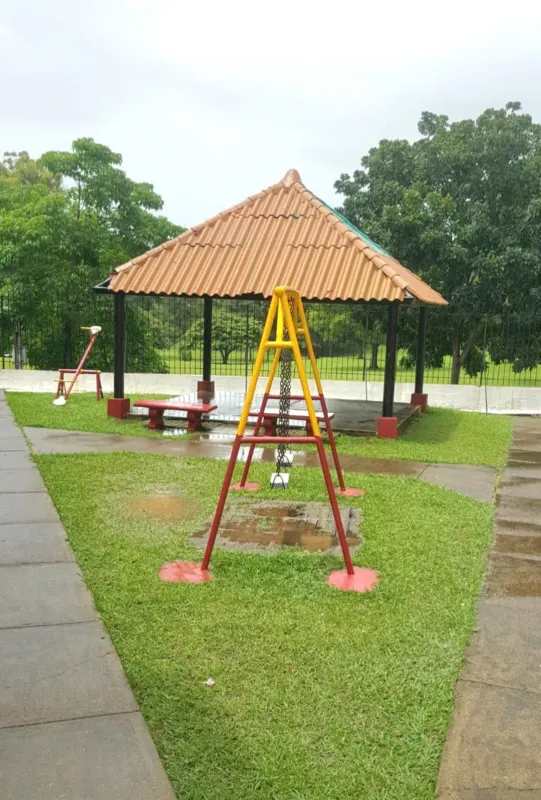 Outdoor playground with swings, seesaw, covered gazebo, picnic tables in San Francisco Panama