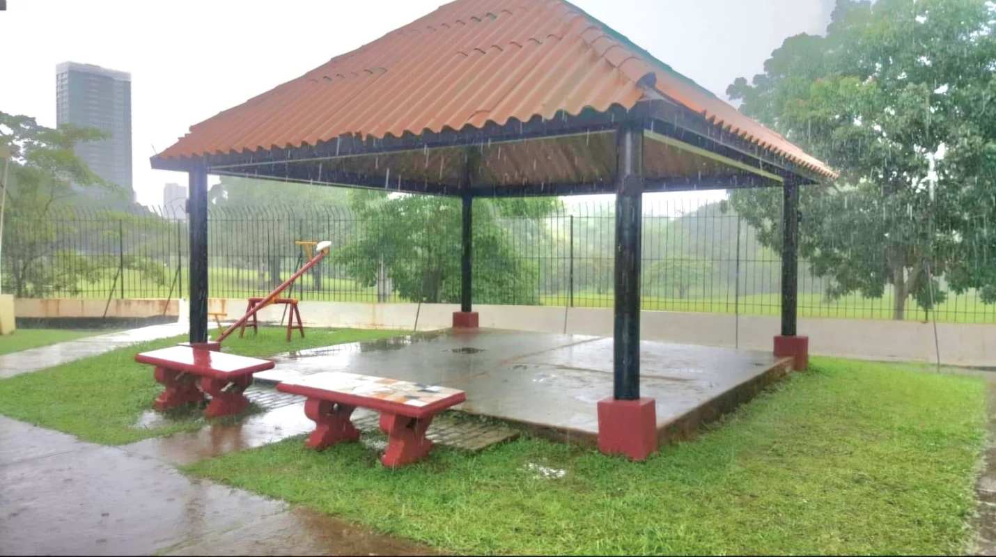 Balcony area with sliding window overlooking gardens, private and covered at San Francisco rental