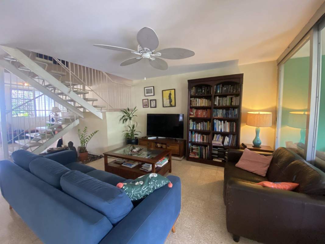 Enclosed terrace patio with ceiling fans natural light plants commercial house El Carmen Panama