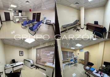 Finished retail unit interior with tiled floors, large windows, natural light in Arraiján shopping plaza Panama