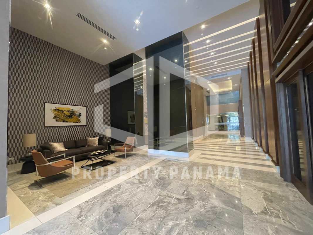 Contemporary kitchen with built-in appliances, panoramic window, and modern cabinetry in luxury apartment Panama