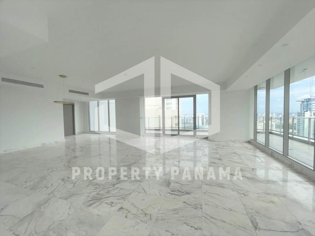 Modern balcony with glass railing overlooking ocean and Panama City skyline Costa del Este