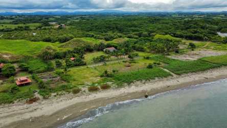 Aerial beachfront property with coastal and green surroundings in Las Tablas Panama