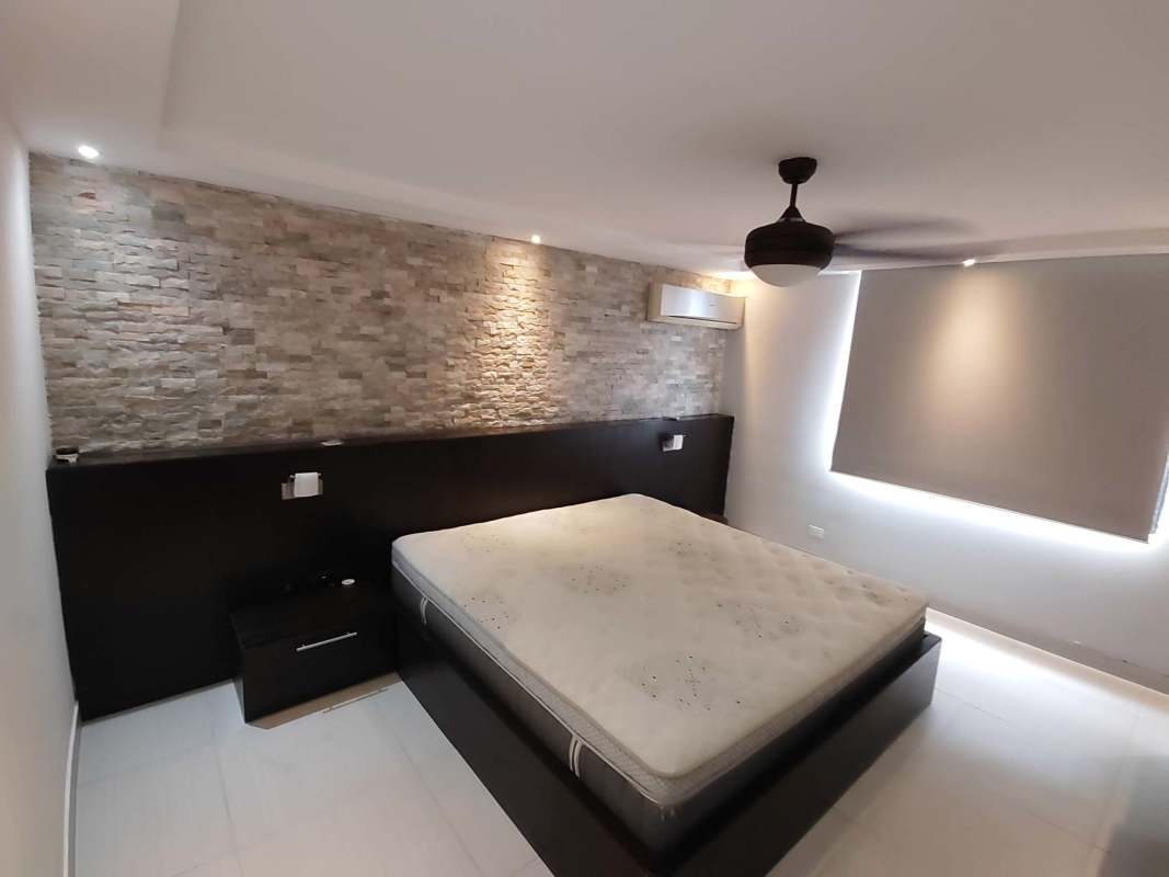 Bedroom with AC, stone wall, ensuite bathroom PH Torres Ebbelle Panama