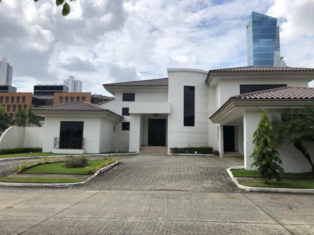 Two-story contemporary villa with landscaped garden and tiled roof in Costa del Este Panama