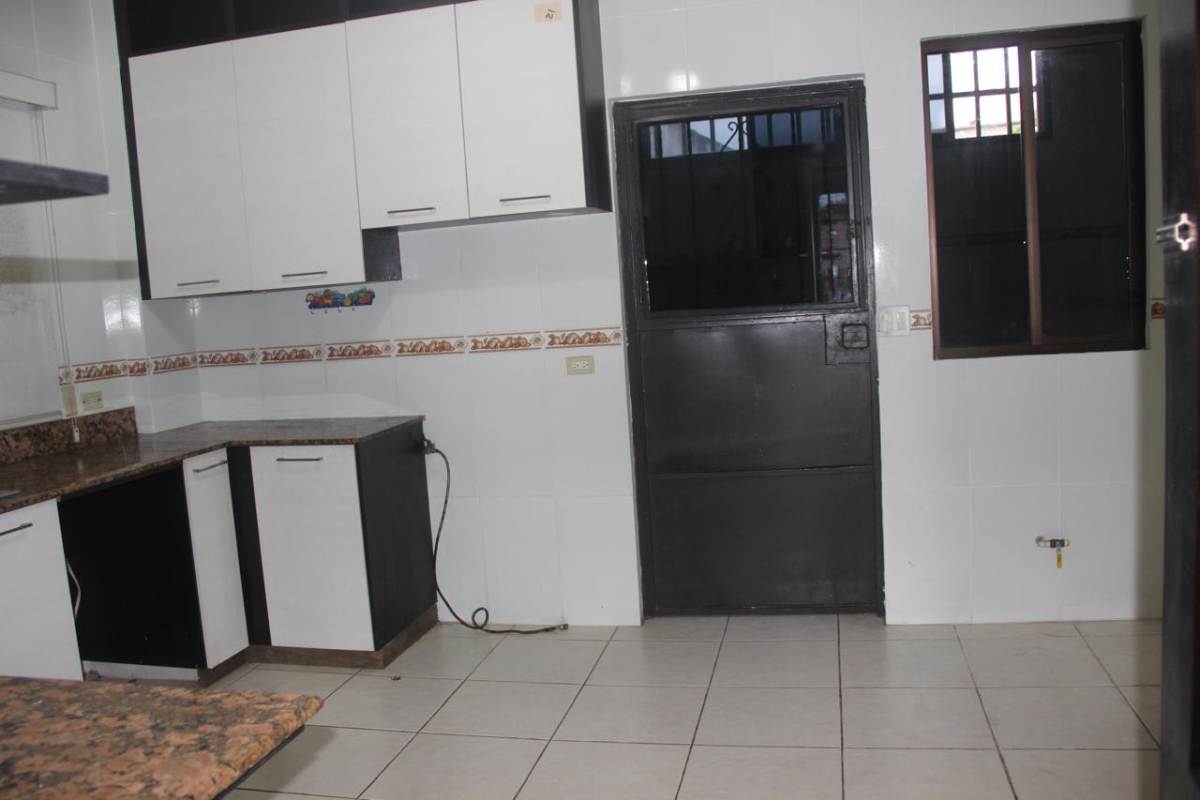 Exterior view two-story Mediterranean home with balcony garage in Villa de las Fuentes Panama