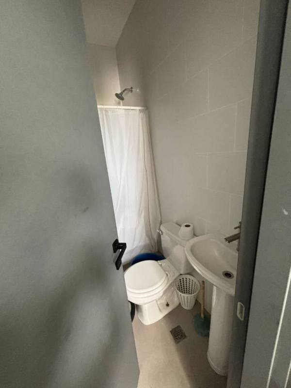 Minimalist secondary bathroom with shower at Victory Sport Coco del Mar