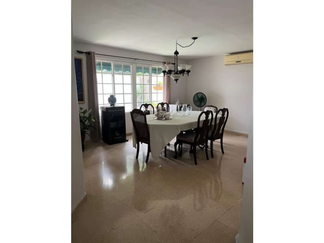 Kids bedroom with large window, twin beds and colorful design in Altos del Golf luxury house Panama