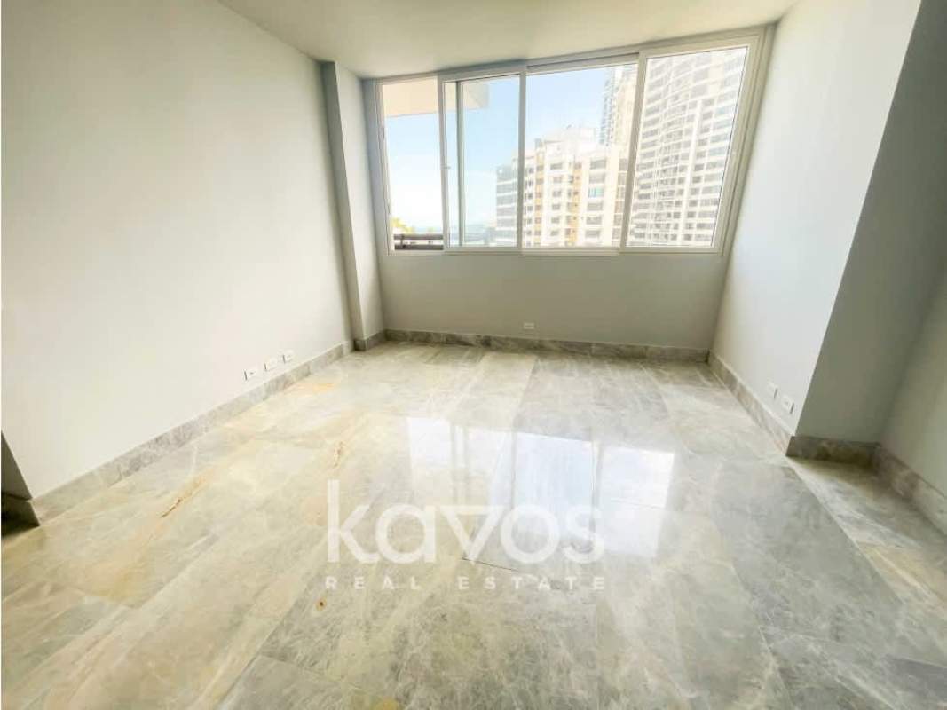 Bright bedroom with panoramic ocean views and marble floors in The Towers Paitilla Panama City