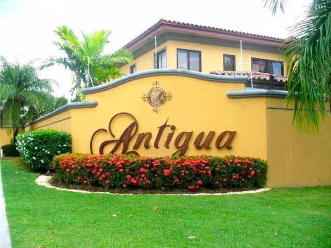 Grand foyer entrance with curved wrought iron staircase in Costa del Este luxury home