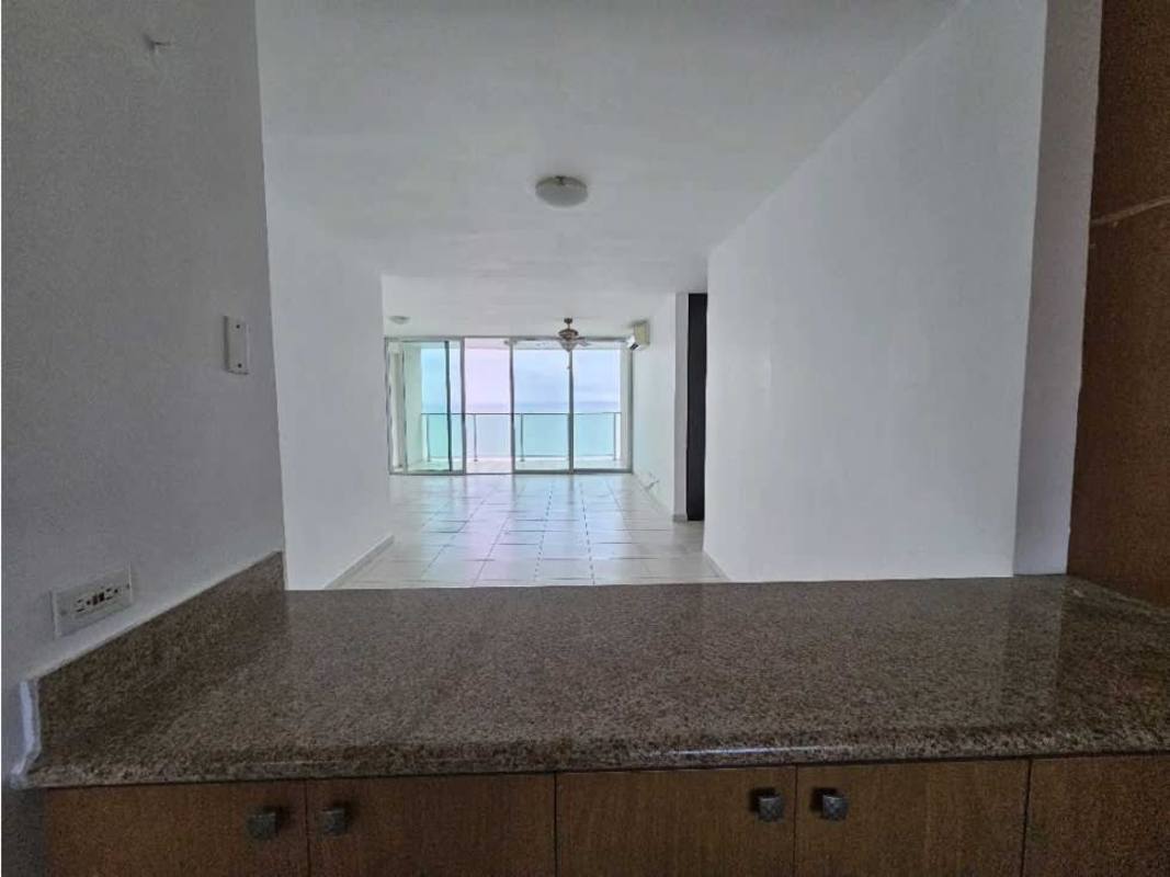 Bright living dining space with large sliding doors balcony ocean view PH Terrasol Panama City