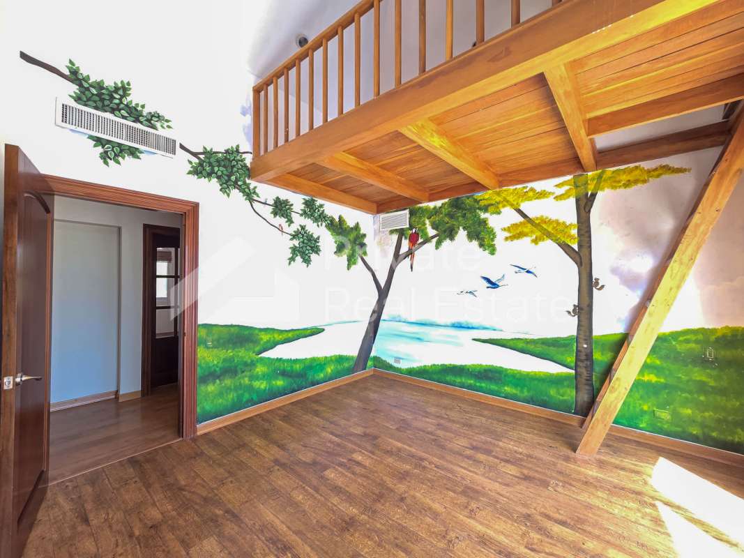 Curved swimming pool jacuzzi spa with mature tropical landscaping luxury home for sale Panama