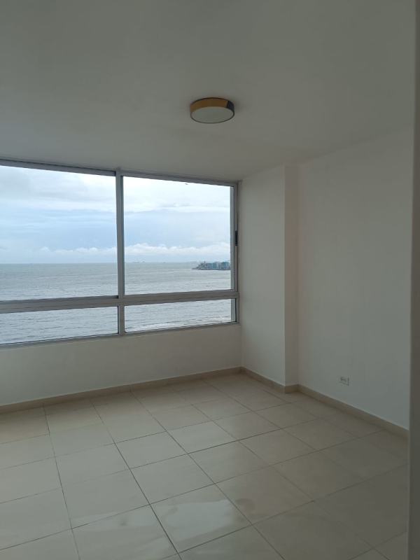 Master bedroom with large windows and stunning ocean views in PH Terrasol Tower 1000