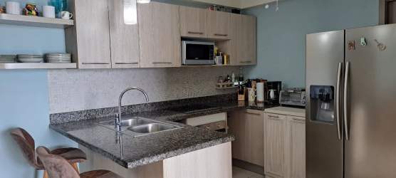 Bedroom featuring balcony access with ocean views, AC and built-in wardrobe in San Carlos Panama