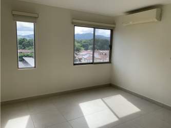 Bright secondary room with large windows and AC in PH Midrise Panama Pacifico condo