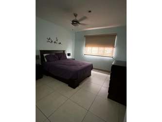 Bedroom with large closet, tiled floors, natural light duplex for sale in Panama Pacifico