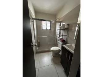 Contemporary bathroom with vanity and glass shower in duplex Panama Pacifico