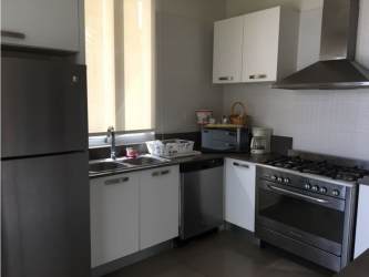 Furnished bedroom with ensuite bathroom and AC at PH Rio Mar Panama San Carlos